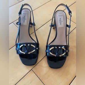 Valentino black patent leather 2” sandals.